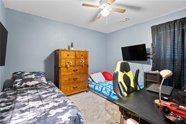 carpeted bedroom featuring ceiling fan