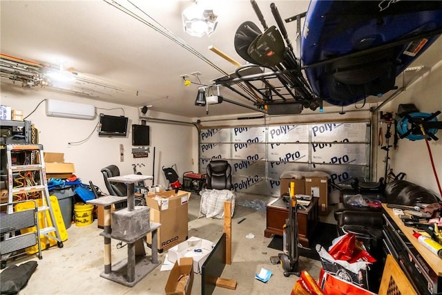 garage with a wall mounted air conditioner and a garage door opener