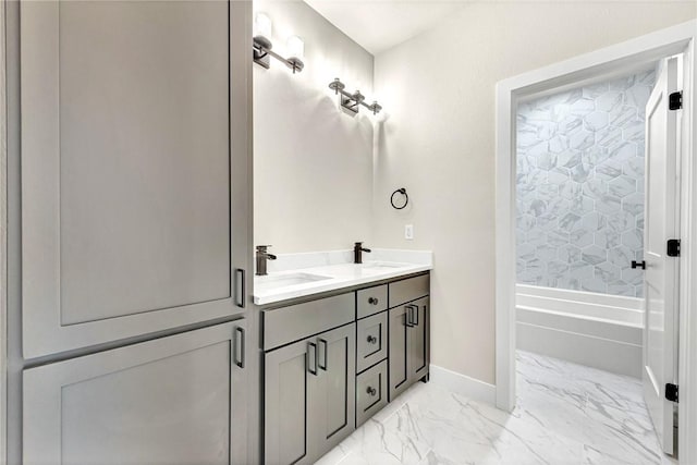 bathroom featuring a bathing tub and vanity