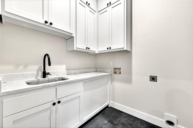 laundry area with cabinets, sink, washer hookup, and hookup for an electric dryer