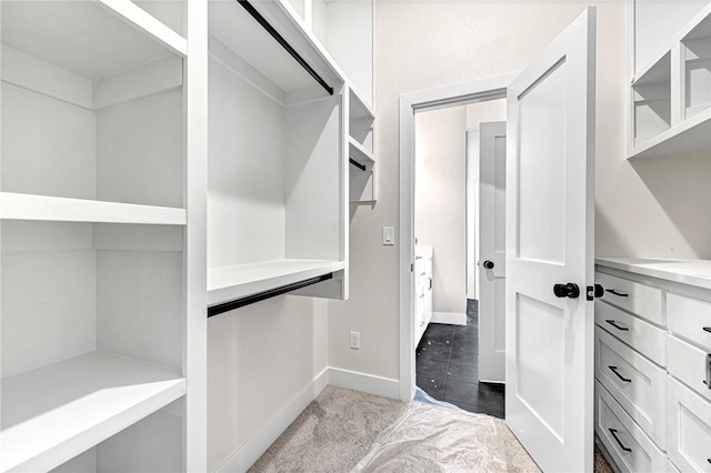 spacious closet with light tile patterned flooring