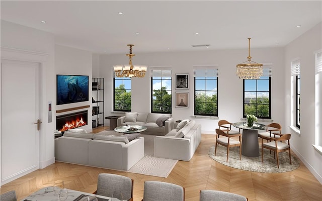 living room featuring light parquet flooring and an inviting chandelier