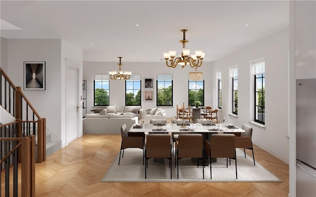 dining space with light parquet flooring and a chandelier