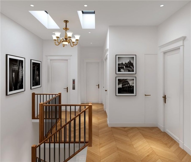 corridor with a chandelier and light parquet floors