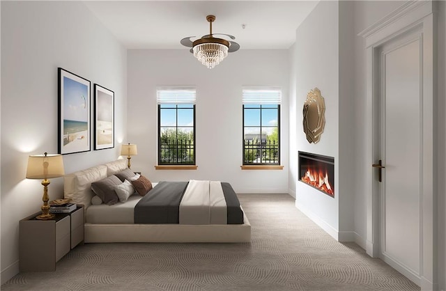 carpeted bedroom with an inviting chandelier