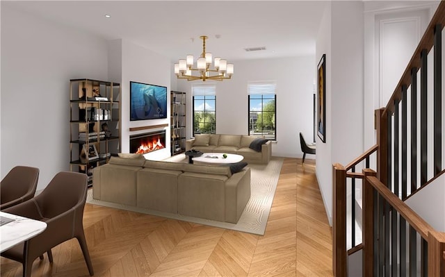 living room featuring light parquet flooring and an inviting chandelier