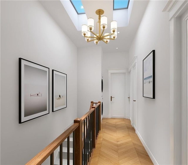 corridor featuring parquet flooring and a notable chandelier