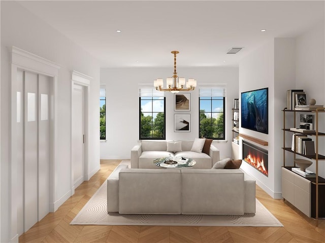 living room with a chandelier and light parquet floors