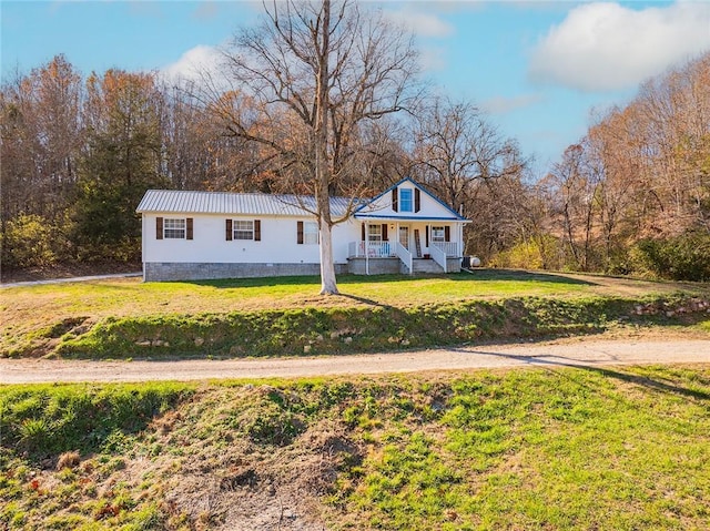 view of front of property with a porch and a front yard