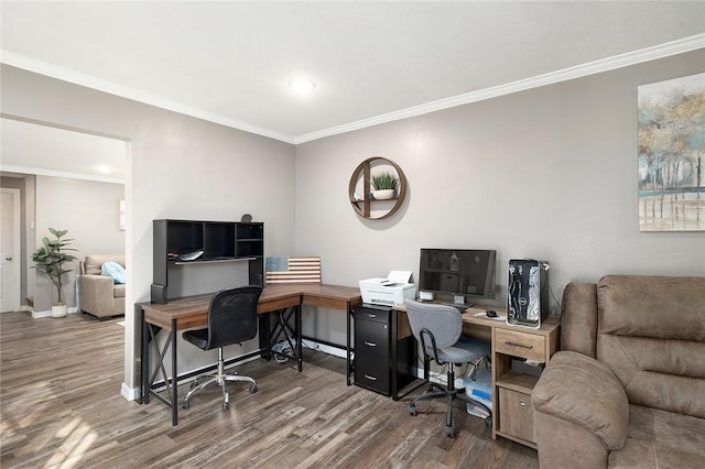 home office featuring wood-type flooring and crown molding