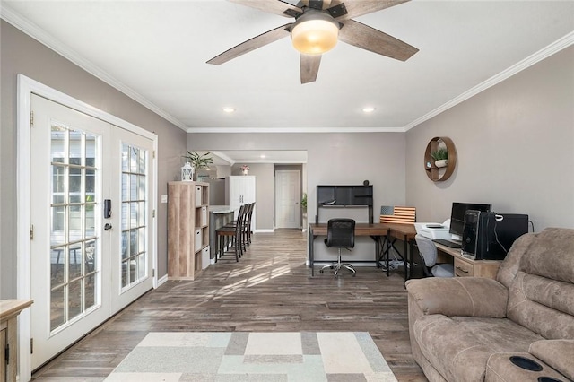 living room featuring ornamental molding, dark wood-type flooring, and french doors