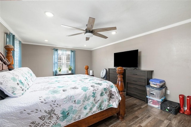 bedroom featuring dark hardwood / wood-style flooring, ceiling fan, and crown molding