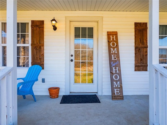 entrance to property with covered porch