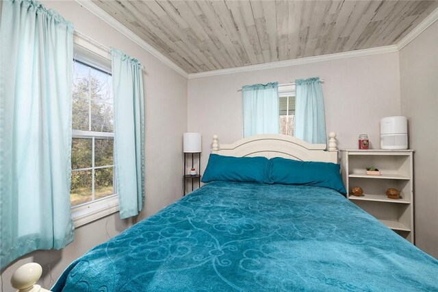 bedroom with wooden ceiling, crown molding, and multiple windows