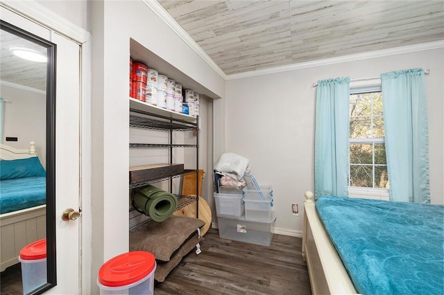 bedroom featuring crown molding and dark hardwood / wood-style floors