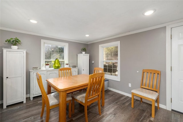 dining room with ornamental molding and dark wood-type flooring