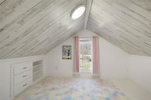 bonus room featuring built in features and lofted ceiling