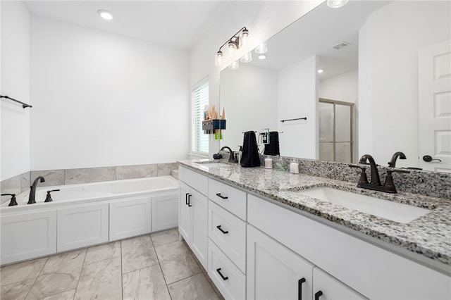 308 S Emerald Woods Run, Farmington, AR 72730 - full bathroom featuring double vanity, marble look tile flooring, a bath, a stall shower, and recessed lighting