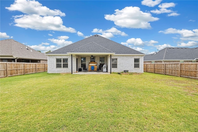 308 S Emerald Woods Run, Farmington, AR 72730 - rear view of house with a ceiling fan, brick siding, a patio area, and a fenced backyard
