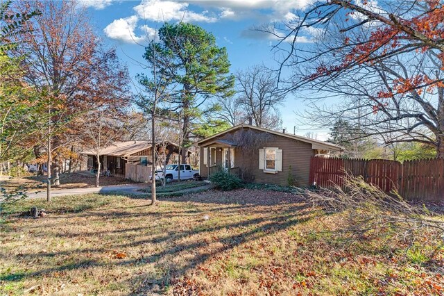 view of property exterior featuring a yard