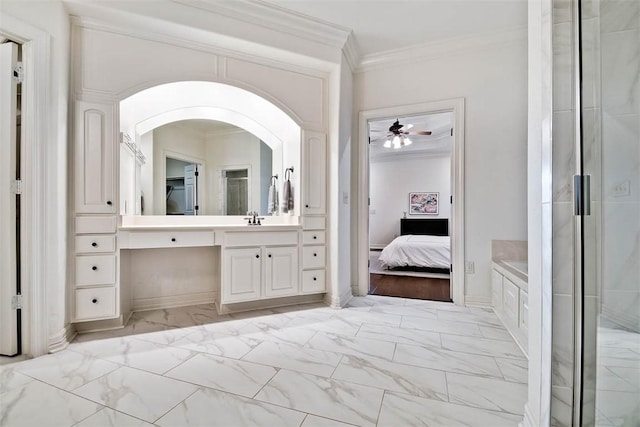 bathroom featuring shower with separate bathtub, vanity, ceiling fan, and ornamental molding