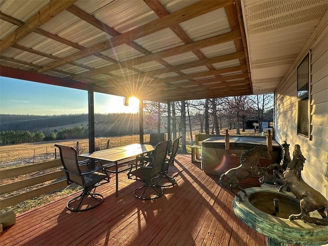 deck featuring a hot tub