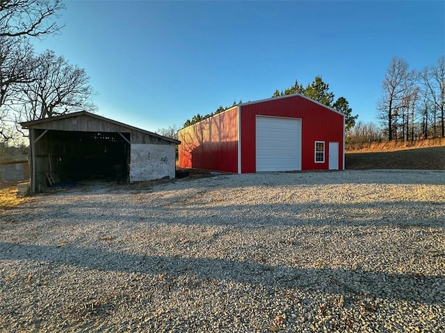 view of outbuilding with a garage