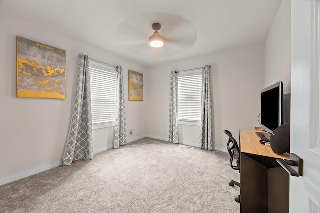 office area featuring carpet and ceiling fan