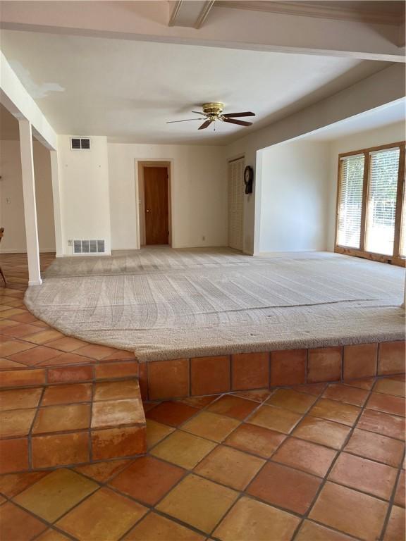 spare room featuring ceiling fan