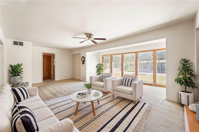 living room with ceiling fan