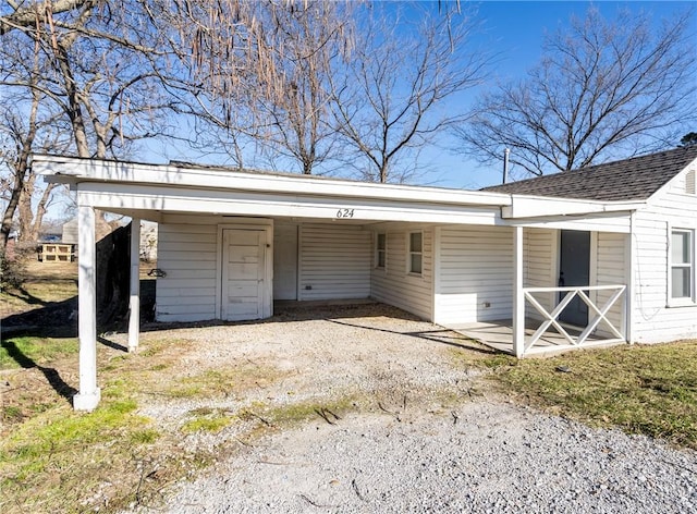 view of outdoor structure with a carport