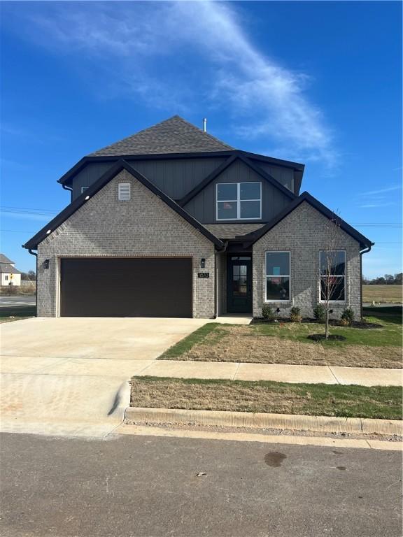 craftsman-style home with a garage