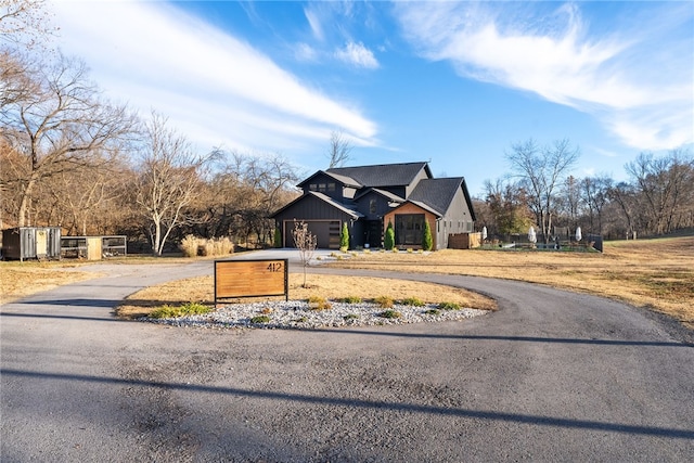 view of front of property featuring a garage