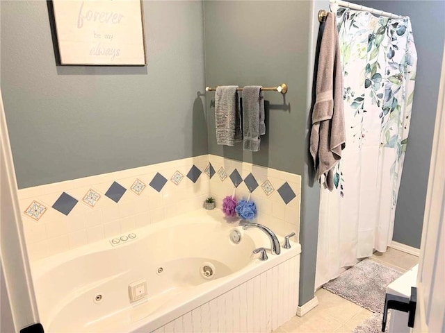 bathroom featuring tile patterned floors and a tub