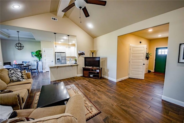 living room featuring vaulted ceiling with beams, dark hardwood / wood-style flooring, ceiling fan with notable chandelier, and sink