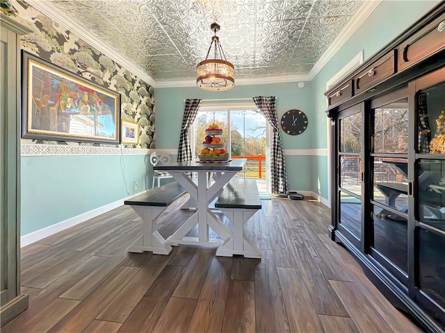 unfurnished dining area with crown molding and dark wood-type flooring