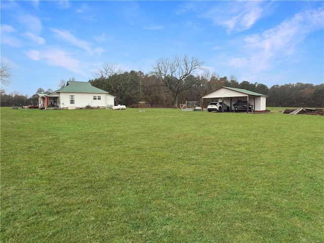 view of yard with a carport