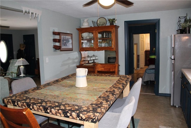 dining room with ceiling fan