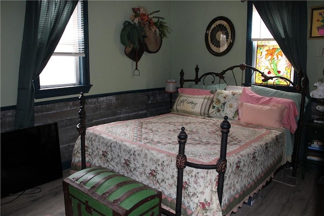 bedroom featuring hardwood / wood-style flooring