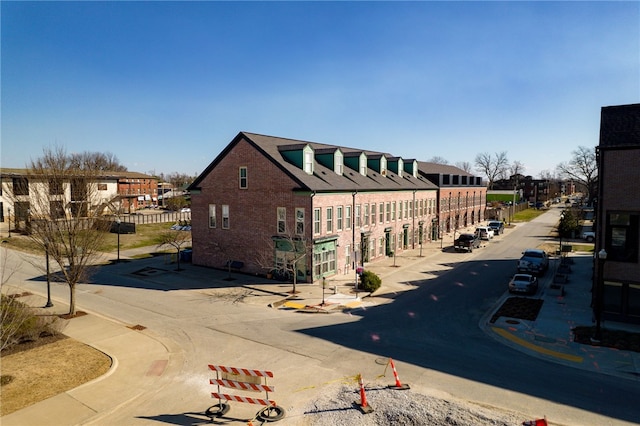 view of building exterior with a residential view