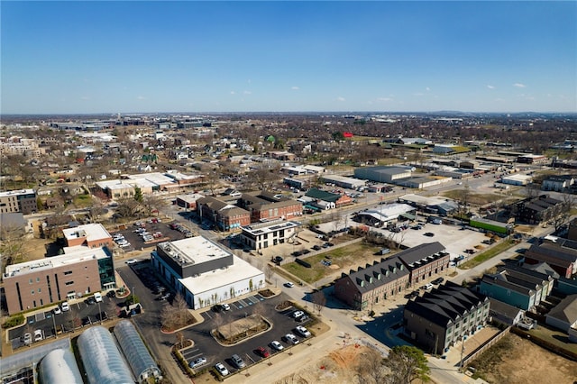 birds eye view of property with a city view