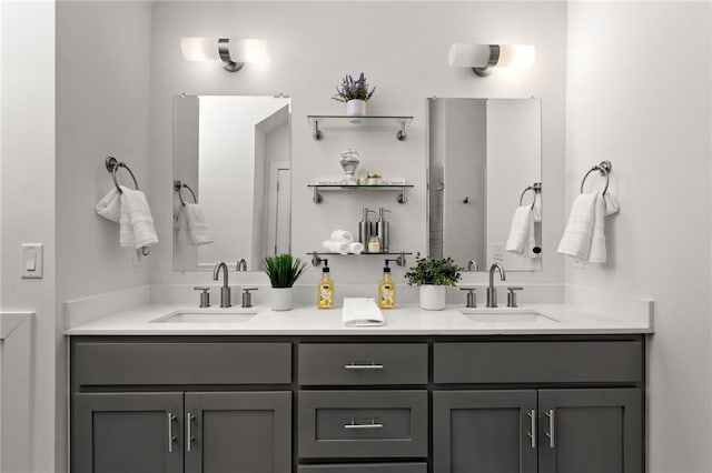 bathroom with double vanity and a sink