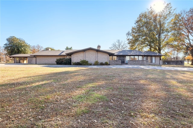 view of front of home with a front yard