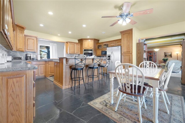 305 Irving St, Gravette, AR 72736 - dining area with ceiling fan