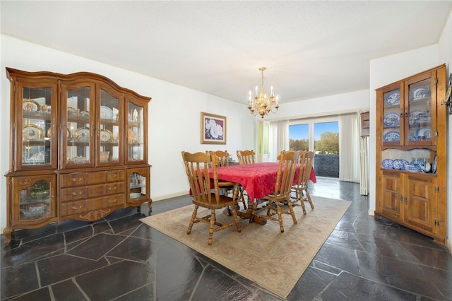 305 Irving St, Gravette, AR 72736 - dining space with an inviting chandelier