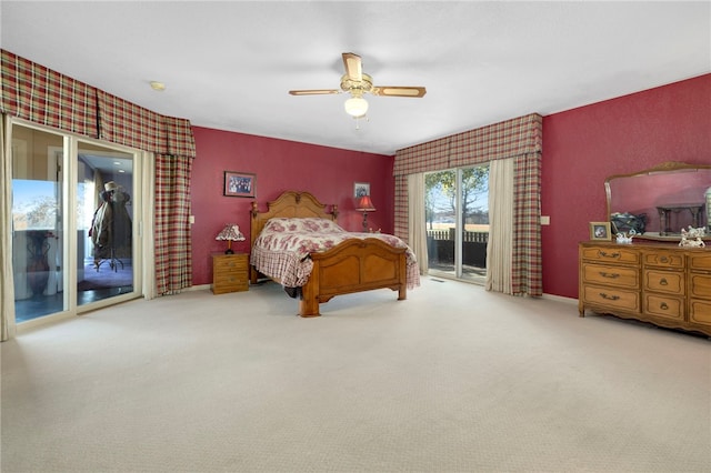 305 Irving St, Gravette, AR 72736 - carpeted bedroom with access to outside and ceiling fan