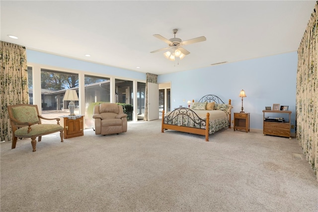 305 Irving St, Gravette, AR 72736 - carpeted bedroom with access to outside and ceiling fan