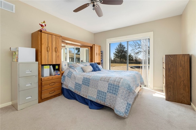305 Irving St, Gravette, AR 72736 - carpeted bedroom with access to outside and ceiling fan