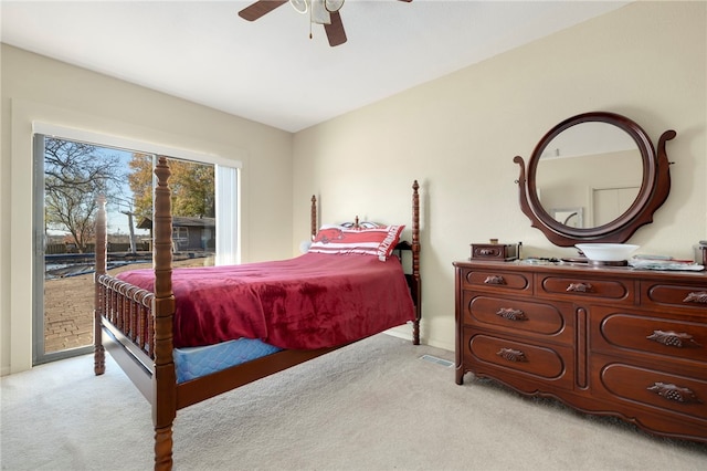 305 Irving St, Gravette, AR 72736 - bedroom featuring light carpet, access to outside, and ceiling fan