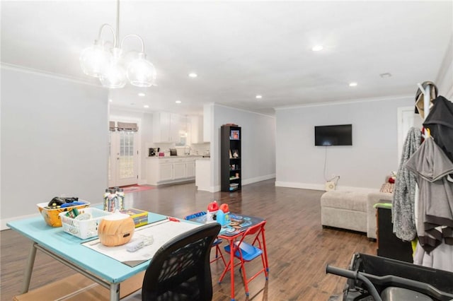 interior space with dark hardwood / wood-style flooring and crown molding